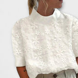 Marta | High-neck blouse with elegant embroidered design