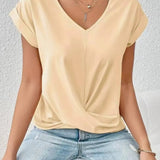 Elena | Blouse with V-neck and button detail